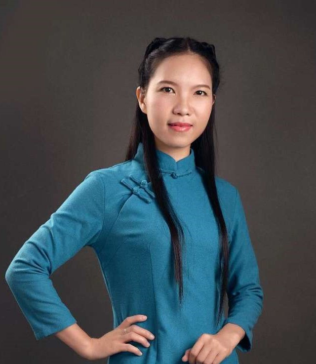 Zhihua Zhang in blue qipao